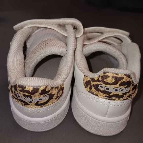 Boys Black nike and white adidas sneakers size 6.